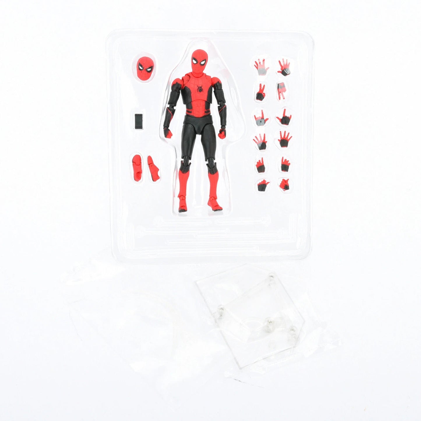 Spider-Man action figure in red and black suit with multiple interchangeable hands and mask in plastic packaging