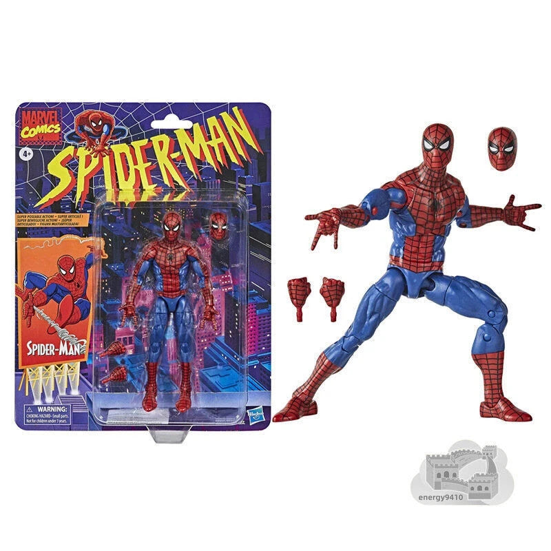 Marvel Spider-Man action figure with interchangeable heads and hands in original packaging against a city skyline background