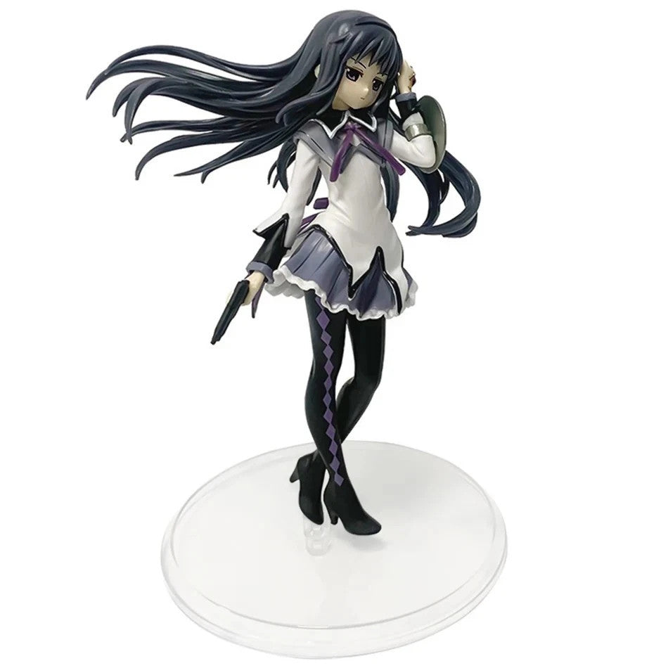 Anime figure of girl with long black hair in school uniform holding a gun on clear base