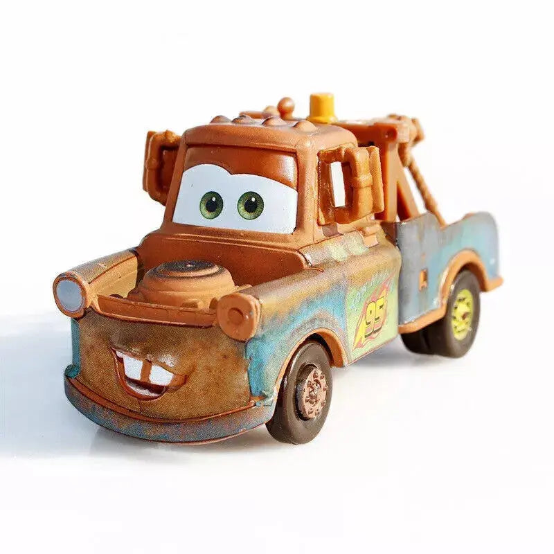 Rusty tow truck toy with smiling face and large green eyes on white background