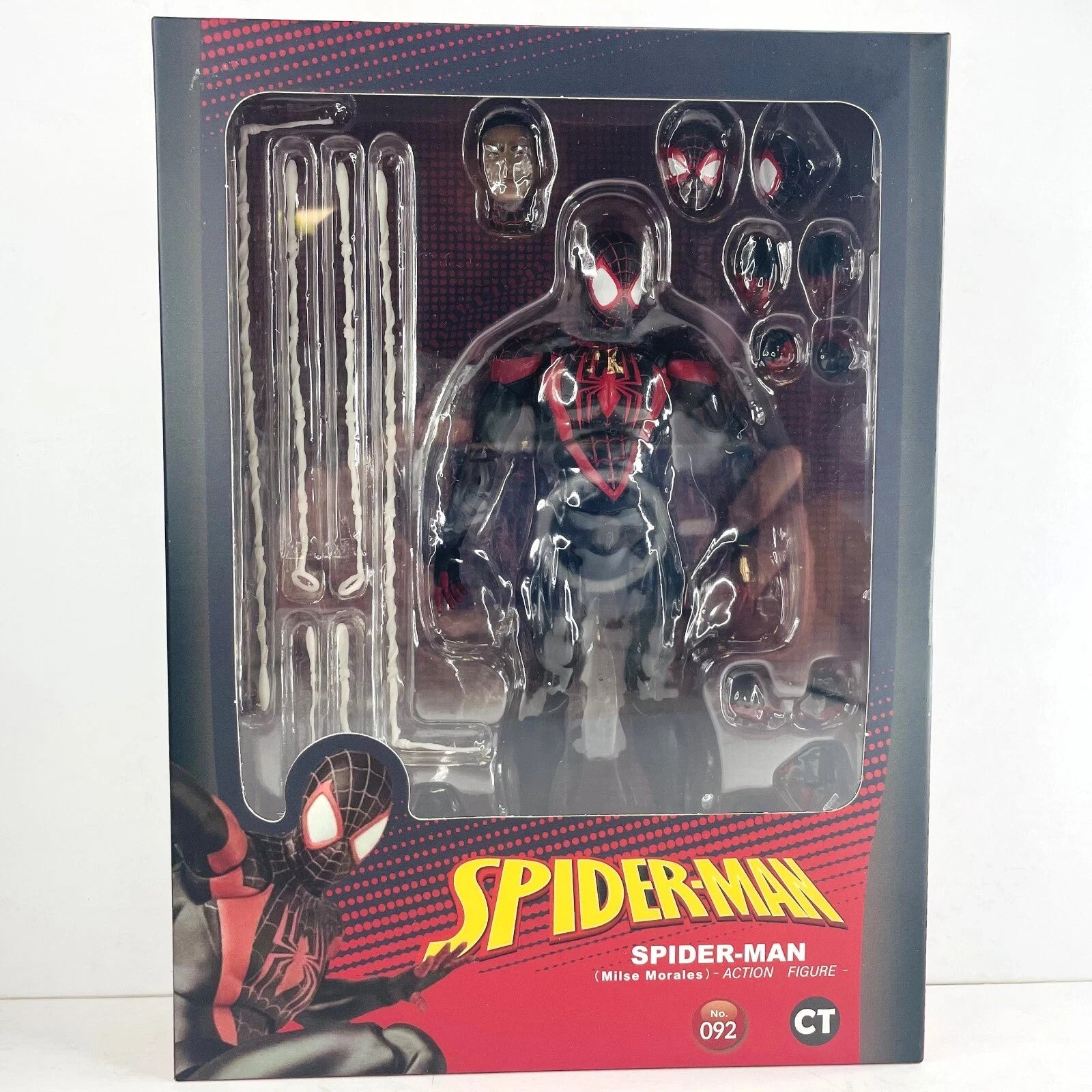 Miles Morales Spider-Man action figure in black and red suit with multiple accessories in packaging