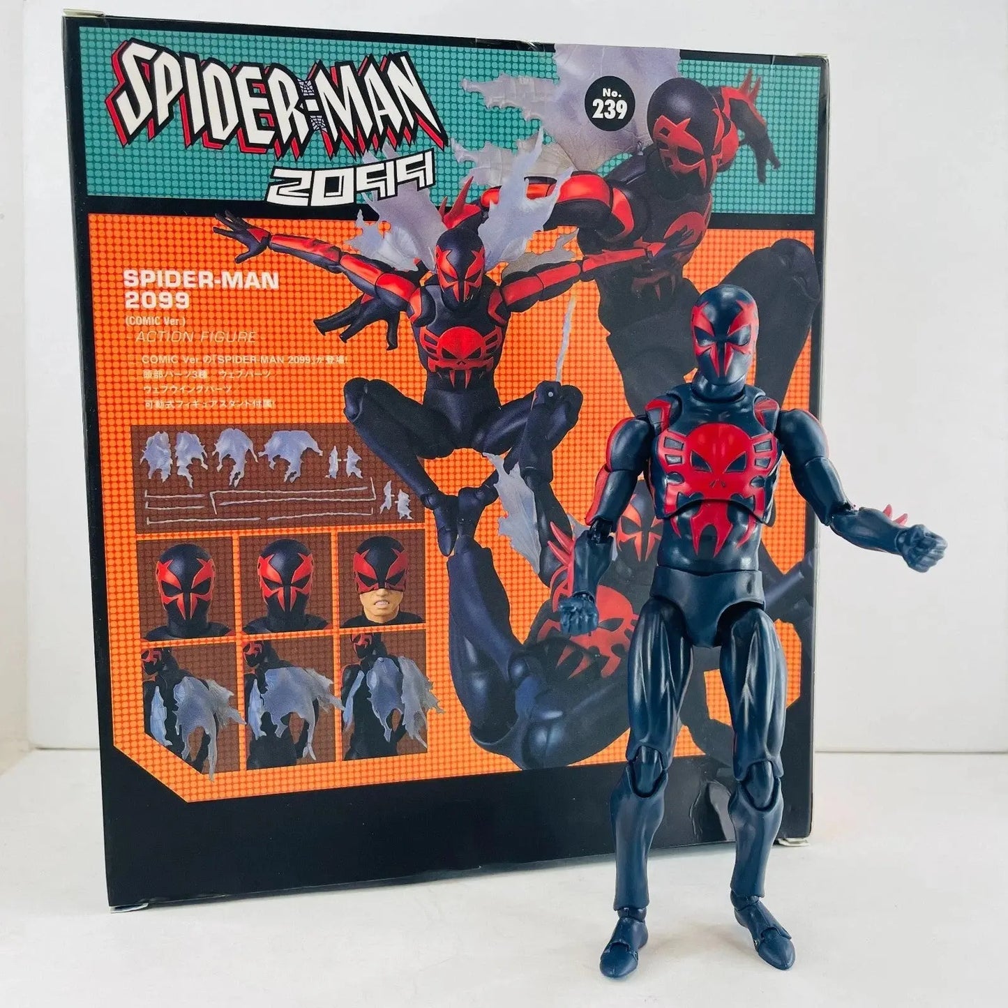 Spider-Man 2099 black and red action figure with detailed packaging showing multiple heads and web effects