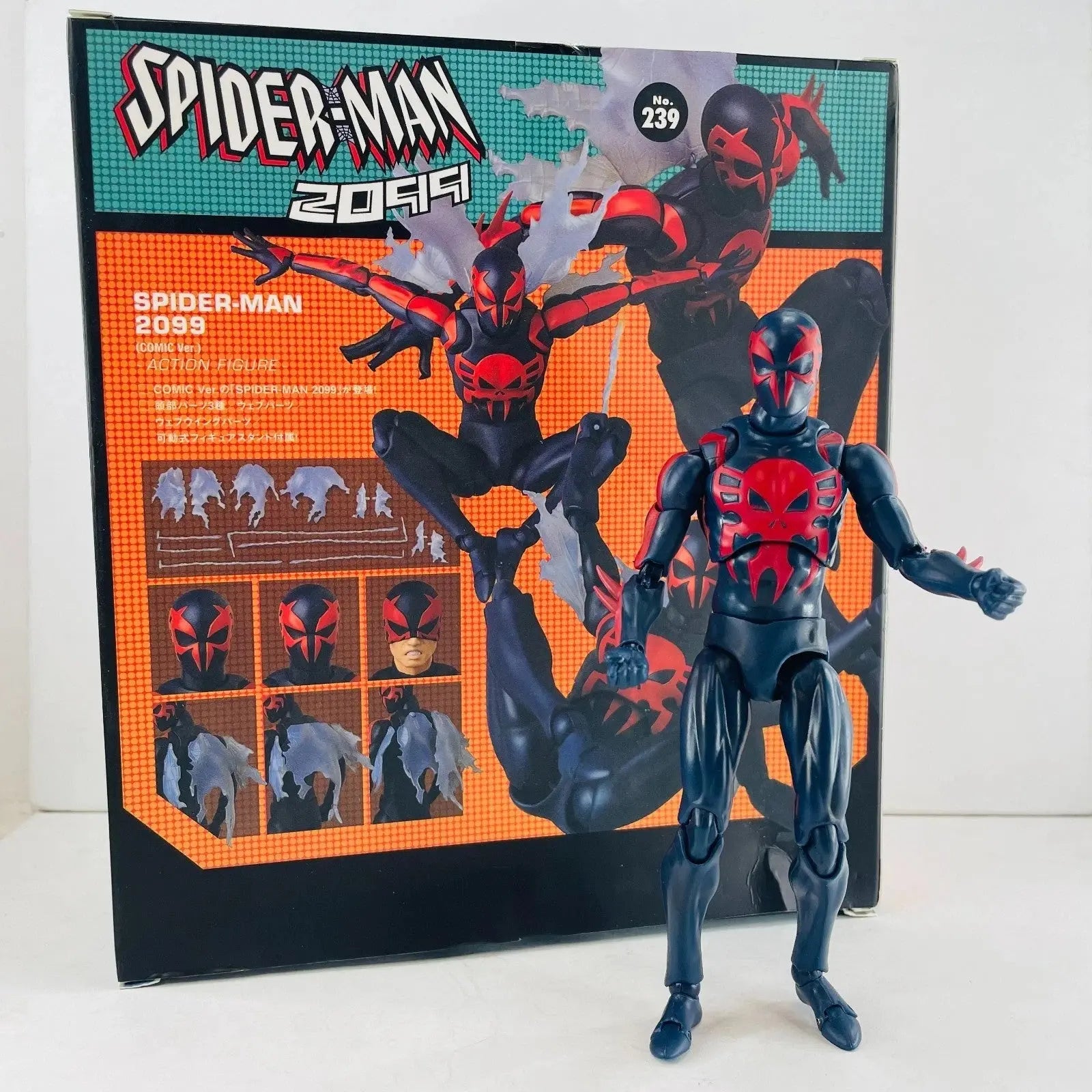 Spider-Man 2099 black and red action figure with detailed packaging showing multiple heads and web effects
