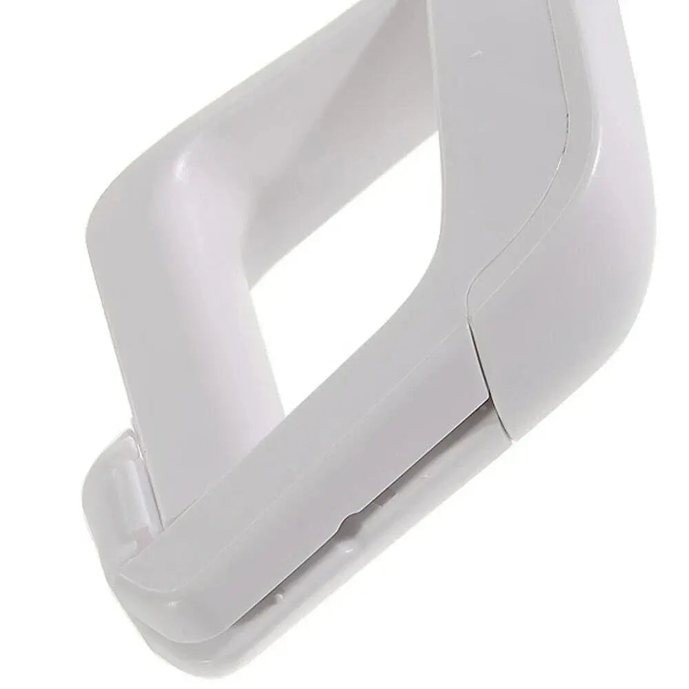 White plastic clip or clamp with a rectangular shape and smooth surface