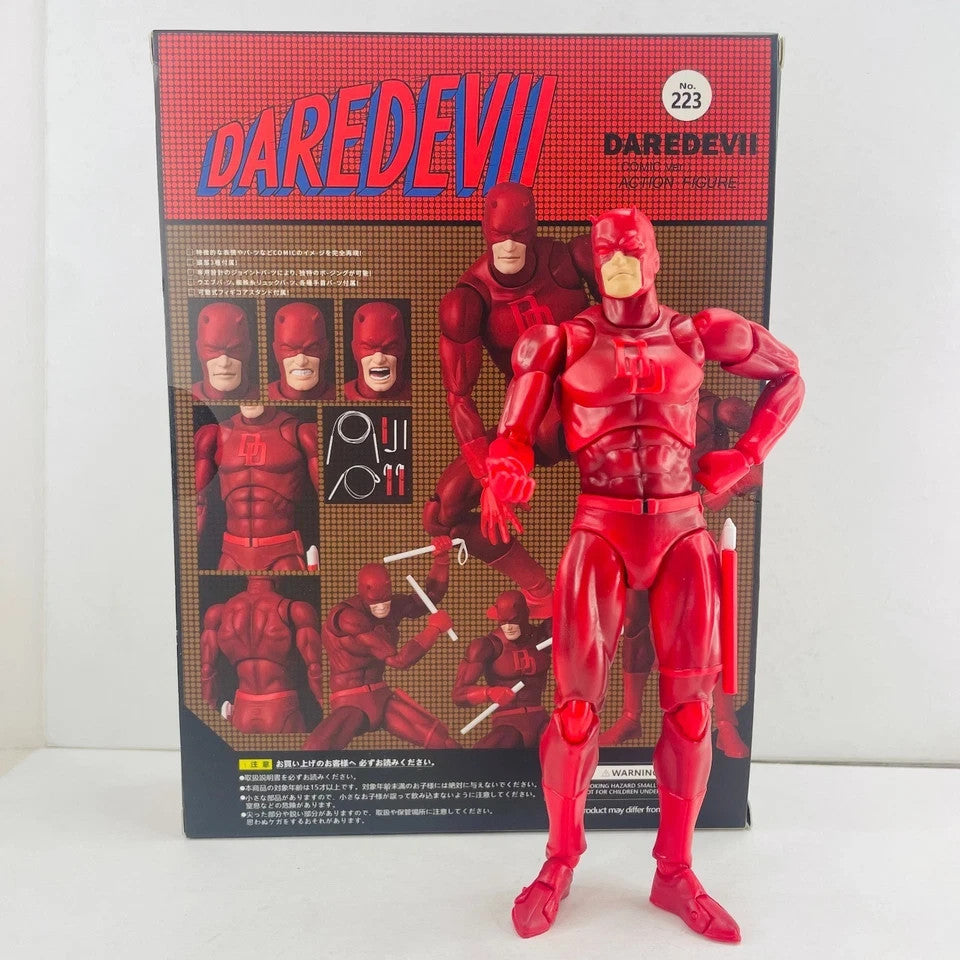 Daredevil action figure collectible with interchangeable heads and accessories, posed in front of its detailed packaging
