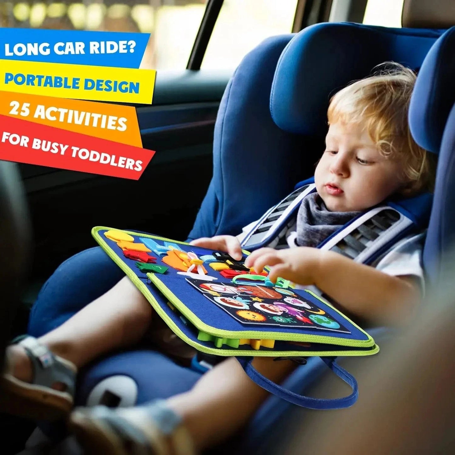Toddler in blue car seat playing with portable activity board with 25 activities for busy toddlers
